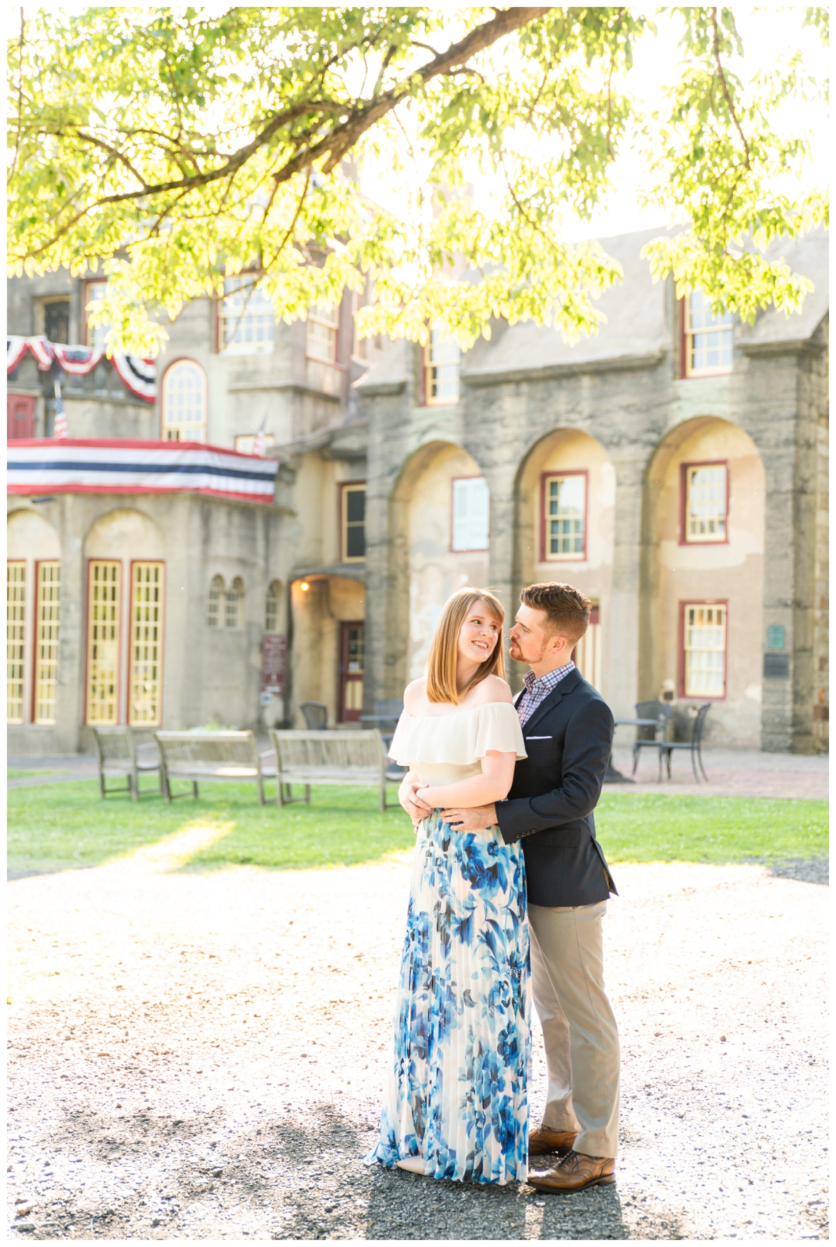 Couple hugging during engagement session at Fonthill Castle in Doylestown, PA