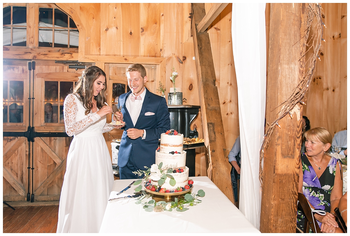 Rustic wedding cake cutting