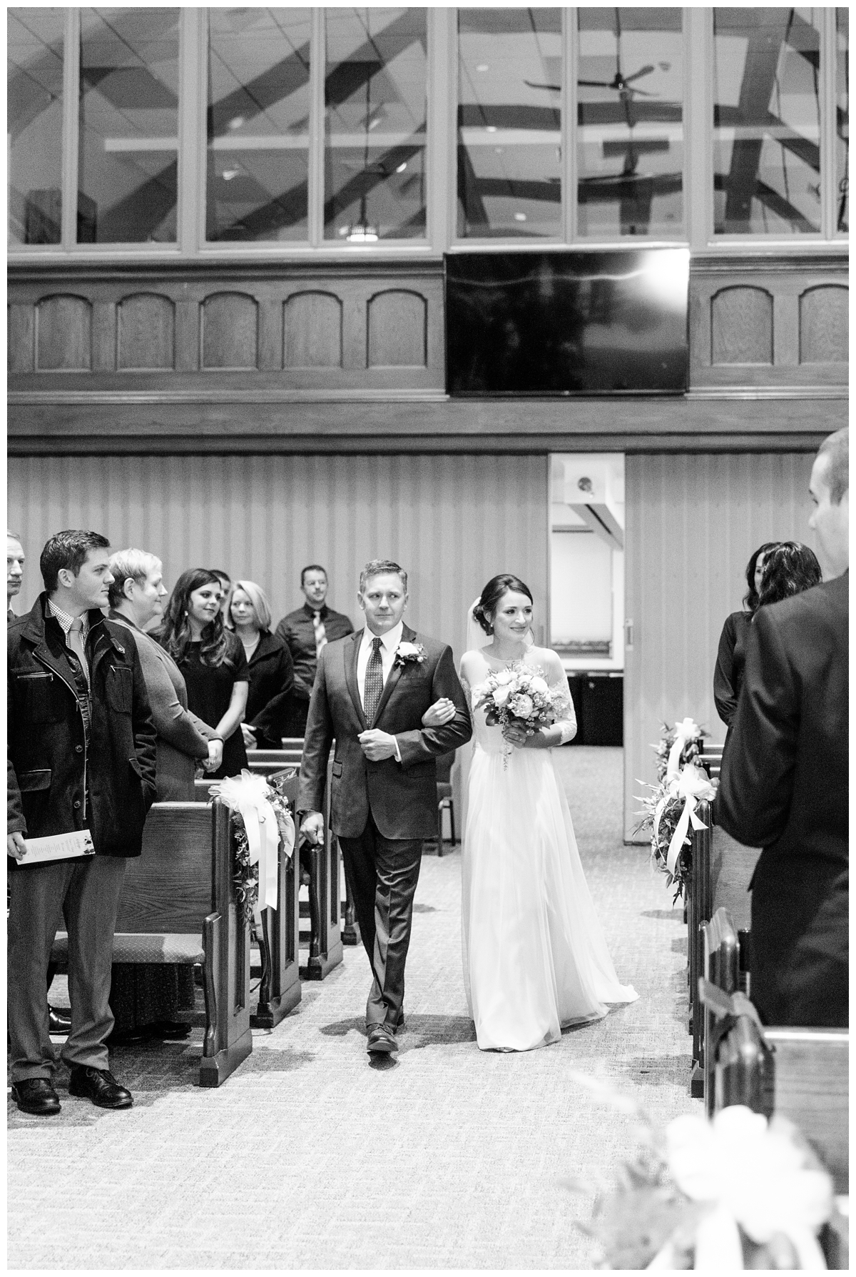 Bride walking down the isle at First United Methodist Church of Hershey
