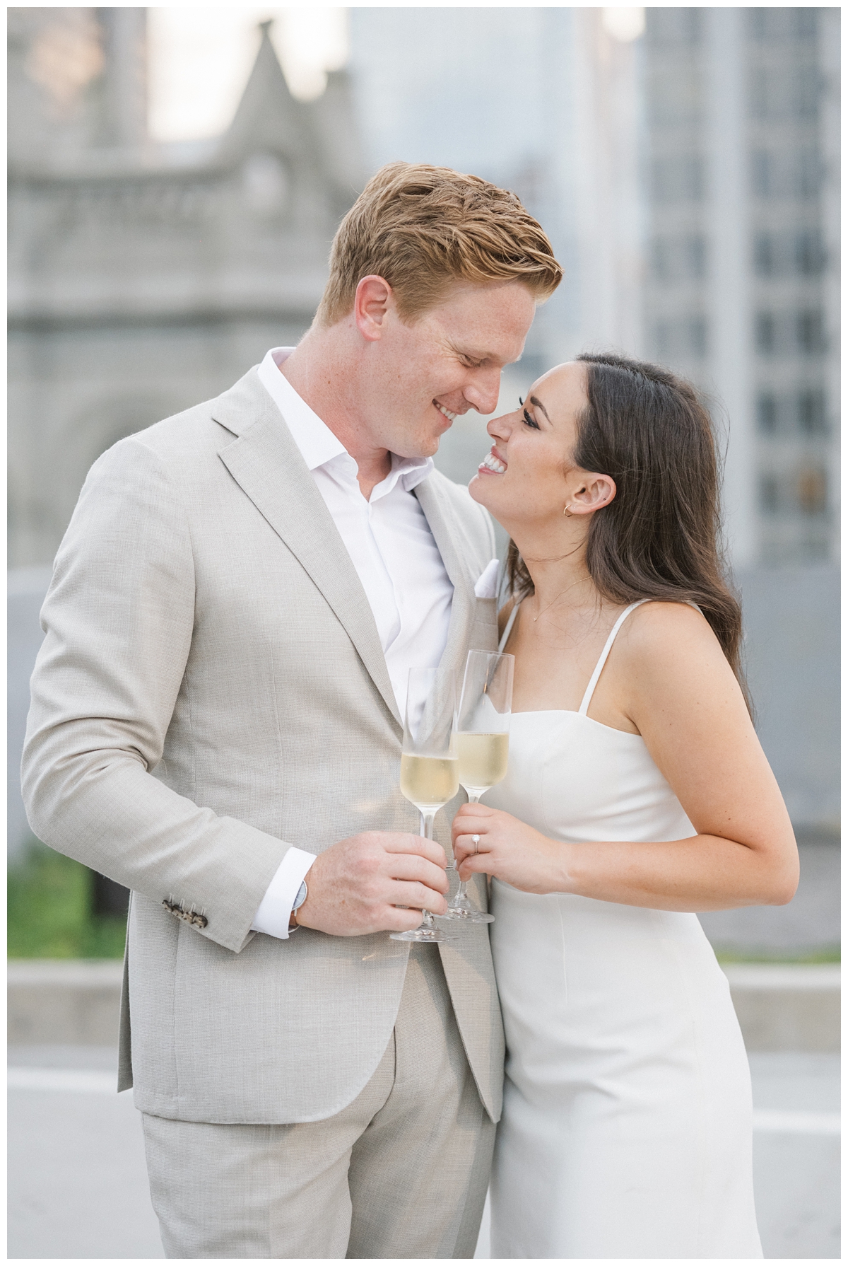 Couple Drinking Champagne During Philadelphia Engagement Photoshoot