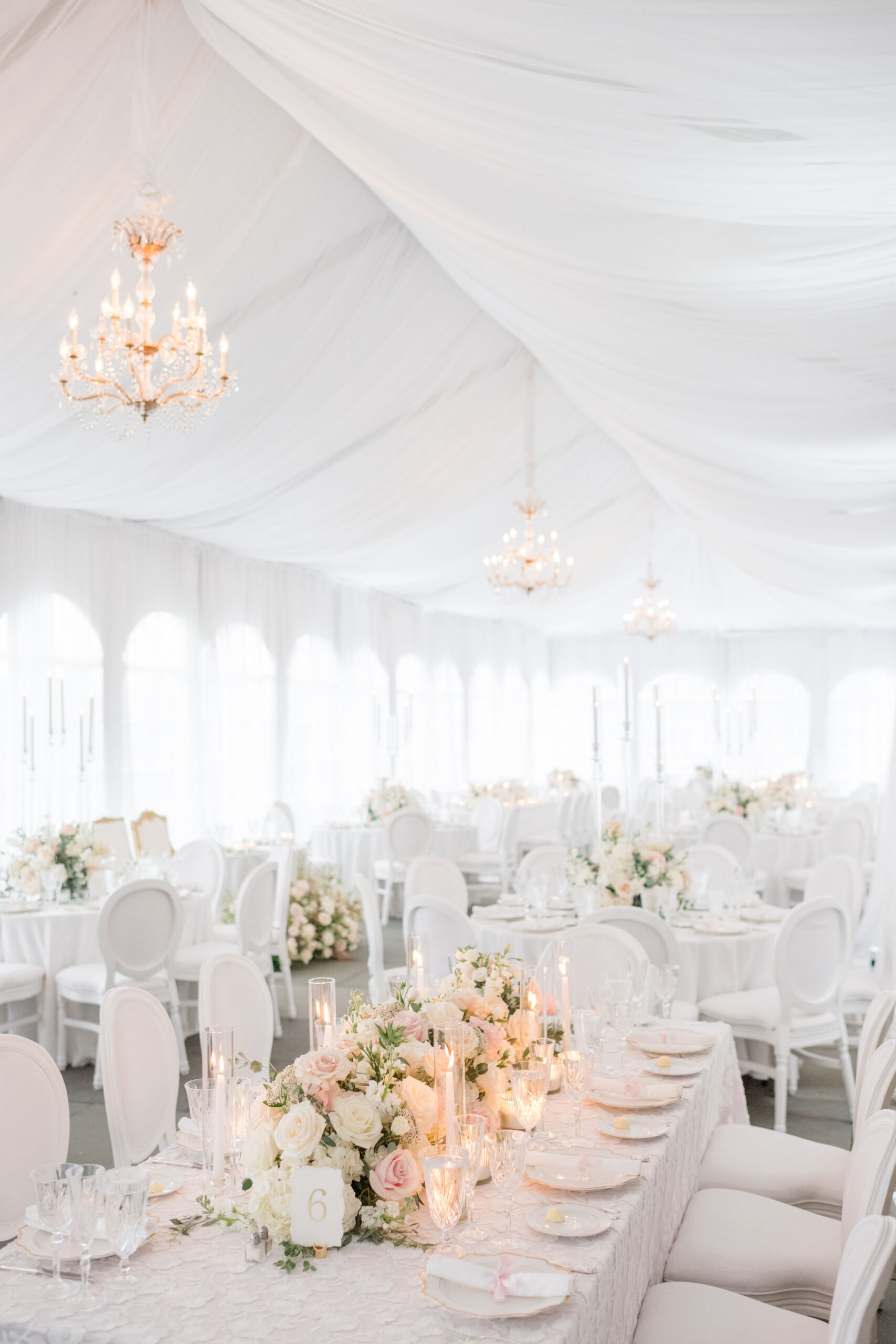 Tented wedding reception setup at Cairnwood Estate